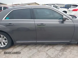 2015 Chrysler 300 Limited with VIN 2C3CCAAG4FH814179, listed as a IAAI auction lot 42058849 with 167,946 mi miles. Bid and sale history available at carsss.com. Image 13.
