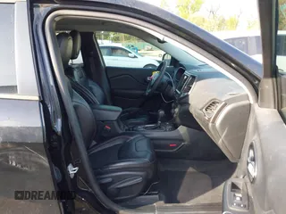 2022 Jeep Cherokee Trailhawk with VIN 1C4PJMBX1ND533715, listed as a IAAI auction lot 42041057 with 65,487 mi miles and . Bid and sale history available at DreamBid. Image 5.