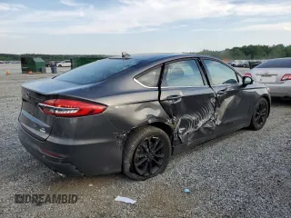 2020 Ford Fusion SE with VIN 3FA6P0HD0LR184251, listed as a Copart auction lot 57325205 with 99,142 mi miles and Salvage title. Bid and sale history available at DreamBid. Image 3.