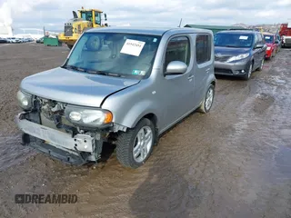 2009 Nissan Cube SL z VIN JN8AZ28R99T111414, wystawiony jako IAAI lot #41542454 z przebiegiem 117 297 mil mil oraz . Historia ofert i sprzedaży dostępna na DreamBid. Obrazek 2.
