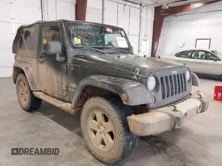 2012 Jeep Wrangler Sahara z VIN 1C4GJWBG5CL232119, wystawiony jako IAAI lot #41380747 z przebiegiem 131 896 mil mil oraz . Historia ofert i sprzedaży dostępna na DreamBid. Obrazek 1.