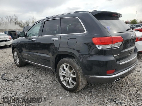 2014 Jeep Grand Cherokee Summit with VIN 1C4RJFJG1EC323658, listed as a Copart auction lot 50740115 with 253,656 mi miles and Salvage title. Bid and sale history available at DreamBid. Image 2.