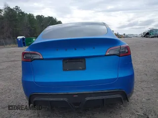 2021 Tesla Model Y Performance z VIN 5YJYGDEF8MF209819, wystawiony jako IAAI lot #41757009 z przebiegiem 37 685 mil mil oraz . Historia ofert i sprzedaży dostępna na DreamBid. Obrazek 16.