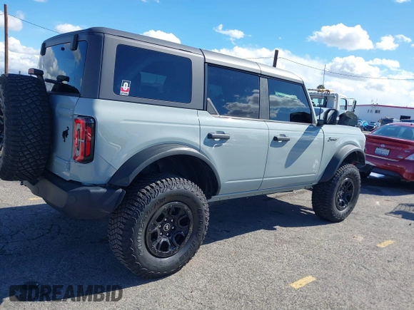 2022 Ford Bronco with VIN 1FMEE5DP1NLB51765, listed as a IAAI auction lot 41792547 with 24,666 mi miles. Bid and sale history available at carsss.com. Image 4.