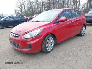 2012 Hyundai Accent SE with VIN KMHCU5AE8CU037718, listed as a IAAI auction lot 41845159 with 167,444 mi miles. Bid and sale history available at carsss.com. Image 2.