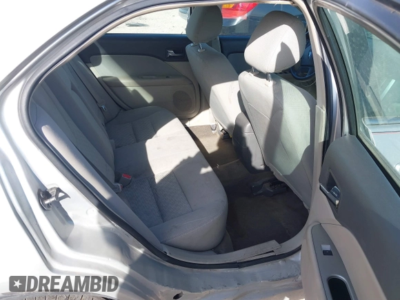 2012 Ford Fusion S with VIN 3FAHP0GA2CR143572, listed as a IAAI auction lot 41826526 with 199,083 mi miles. Bid and sale history available at carsss.com. Image 8.