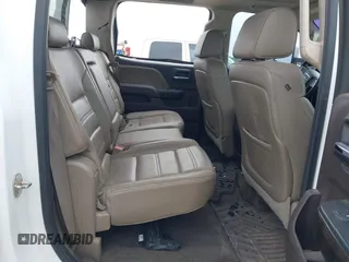 2015 GMC Sierra 2500HD available WiFi Denali with VIN 1GT120E84FF642823, listed as a IAAI auction lot 41593286 with 148,038 mi miles. Bid and sale history available at carsss.com. Image 8.