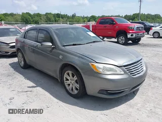 2011 Chrysler 200 Touring with VIN 1C3BC1FG0BN602899, listed as a IAAI auction lot 42118809 with 129,980 mi miles. Bid and sale history available at carsss.com. Image 1.
