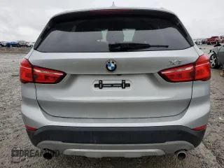 2017 BMW X1 sDrive28i with VIN WBXHU7C33H5H34013, listed as a Copart auction lot 38409444 with 87,558 mi miles and Salvage Title. Bid and sale history available at carsss.com. Image 6.