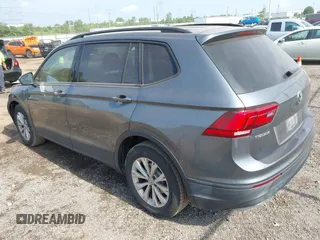 2018 Volkswagen Tiguan S with VIN 3VV0B7AX5JM108306, listed as a IAAI auction lot 42741783 with 71,040 mi miles and . Bid and sale history available at DreamBid. Image 3.