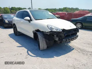 2012 Porsche Cayenne S z VIN WP1AB2A29CLA43330, wystawiony jako IAAI lot #42004059 z przebiegiem 153 419 mil mil oraz . Historia ofert i sprzedaży dostępna na DreamBid. Obrazek 1.