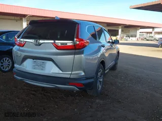 2019 Honda CR-V LX with VIN 2HKRW5H34KH420447, listed as a IAAI auction lot 41616151 with 104,373 mi miles. Bid and sale history available at carsss.com. Image 4.