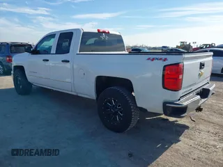 2014 Chevrolet Silverado 1500 LT with VIN 1GCVKREH4EZ343111, listed as a IAAI auction lot 41339803 with 185,314 mi miles and . Bid and sale history available at DreamBid. Image 3.