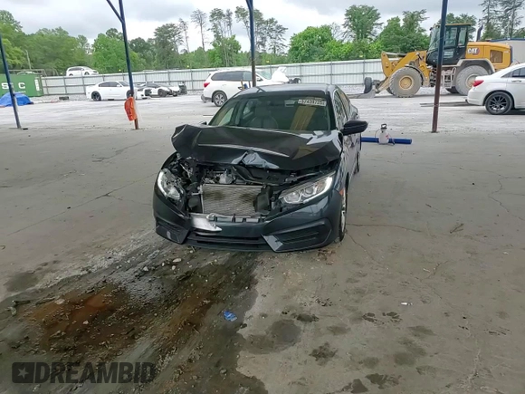 2017 Honda Civic LX z VIN 19XFC2F54HE014695, wystawiony jako Copart lot #57439725 z przebiegiem 88 092 mil mil oraz Szkoda całkowita • Salvage title. Historia ofert i sprzedaży dostępna na DreamBid. Obrazek 13.