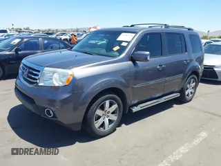 2014 Honda Pilot Touring z VIN 5FNYF4H90EB033259, wystawiony jako IAAI lot #42287774 z przebiegiem 115 416 mil mil oraz . Historia ofert i sprzedaży dostępna na DreamBid. Obrazek 2.