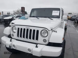 2016 Jeep Wrangler Unlimited Sahara with VIN 1C4HJWEG8GL240950, listed as a IAAI auction lot 41443059 with Not provided miles and . Bid and sale history available at DreamBid. Image 6.