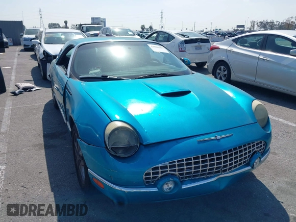 2004 Ford Thunderbird Deluxe with VIN 1FAHP60A14Y106321, listed as a IAAI auction lot 42086505 with Not Provided miles. Bid and sale history available at carsss.com. Image 1.