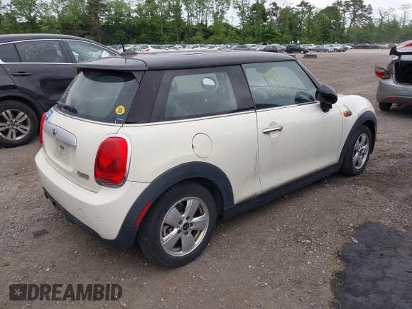 2014 MINI Hardtop with VIN WMWXM5C56ET936943, listed as a IAAI auction lot 42326780 with Not provided miles and . Bid and sale history available at DreamBid. Image 4.