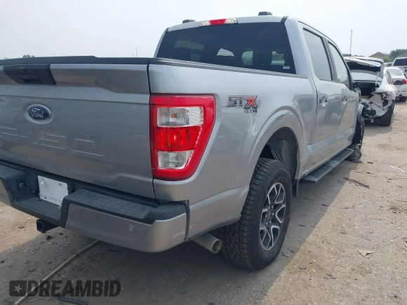2022 Ford F-150 XL with VIN 1FTFW1E52NFA73233, listed as a IAAI auction lot 42311048 with 14,298 mi miles and . Bid and sale history available at DreamBid. Image 4.