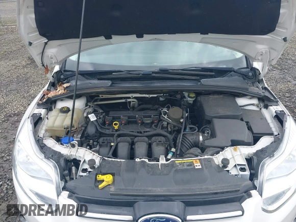2014 Ford Focus Titanium with VIN 1FADP3J27EL142095, listed as a IAAI auction lot 42004419 with 139,515 mi miles. Bid and sale history available at carsss.com. Image 10.
