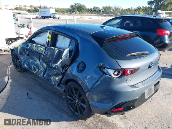 2022 Mazda Mazda3 Hatchback Premium with VIN JM1BPBML8N1520307, listed as a IAAI auction lot 41059877 with 39,497 mi miles. Bid and sale history available at carsss.com. Image 3.