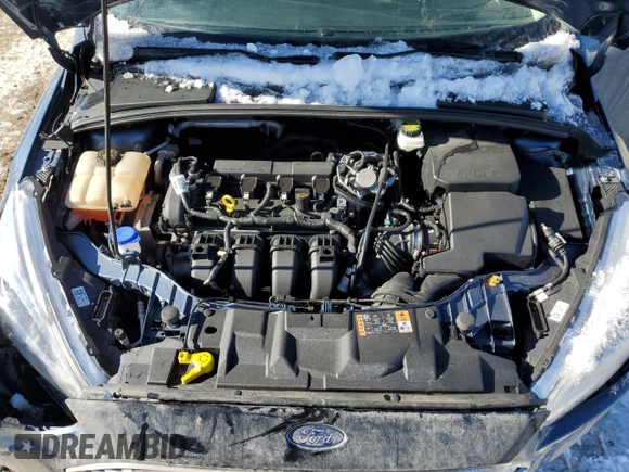 2018 Ford Focus Titanium z VIN 1FADP3N2XJL297048, wystawiony jako Copart lot #61579925 z przebiegiem 68 774 mil mil oraz Szkoda całkowita • Salvage title. Historia ofert i sprzedaży dostępna na DreamBid. Obrazek 11.
