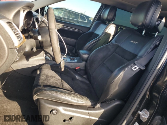 2012 Jeep Grand Cherokee SRT8 with VIN 1C4RJFDJ9CC346867, listed as a Copart auction lot 86349154 with 125,130 mi miles and Salvage Title. Bid and sale history available at carsss.com. Image 7.