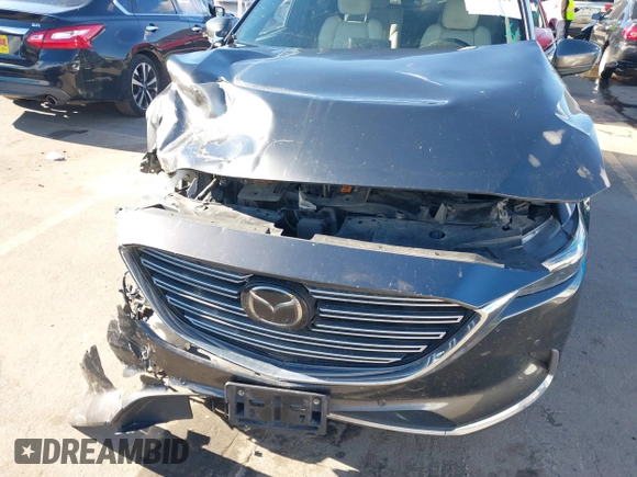 2020 Mazda CX-9 Signature with VIN JM3TCBEYXL0410265, listed as a IAAI auction lot 41226109 with Not Provided miles and . Bid and sale history available at carsss.com. Image 6.