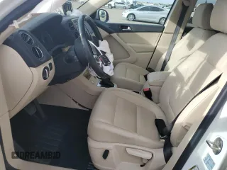 2017 Volkswagen Tiguan S with VIN WVGAV7AX9HK017871, listed as a Copart auction lot 48767785 with 49,608 mi miles and Salvage Title. Bid and sale history available at DreamBid. Image 7.