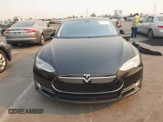 2013 Tesla Model S with VIN 5YJSA1CN3DFP06986, listed as a IAAI auction lot 41271801 with 150,307 mi miles and . Bid and sale history available at DreamBid. Image 12.