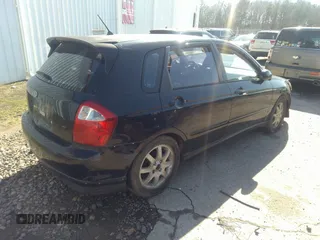 2005 Kia Spectra with VIN KNAFE161955072856, listed as a IAAI auction lot 41767352 with 264,251 mi miles. Bid and sale history available at carsss.com. Image 4.