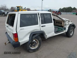 1996 Jeep Cherokee SE with VIN 1J4FJ28S6TL230275, listed as a IAAI auction lot 41731116 with 172,361 mi miles and . Bid and sale history available at DreamBid. Image 4.