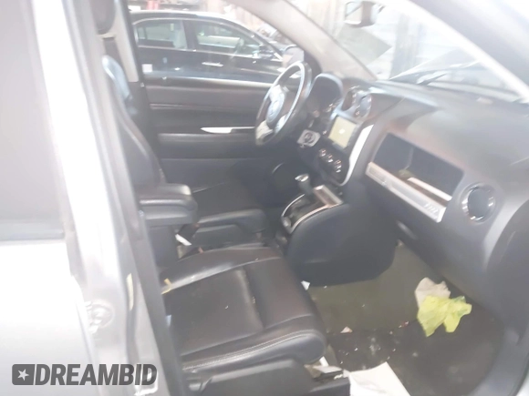 2016 Jeep Compass High Altitude Edition with VIN 1C4NJCEA2GD720148, listed as a IAAI auction lot 41689653 with 97,400 mi miles. Bid and sale history available at carsss.com. Image 5.