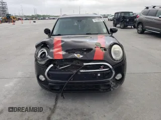 2015 MINI Hardtop 4 Door S z VIN WMWXU3C5XF2B56104, wystawiony jako Copart lot #51189075 z przebiegiem 113 586 mil mil oraz Szkoda całkowita • Salvage title. Historia ofert i sprzedaży dostępna na DreamBid. Obrazek 5.