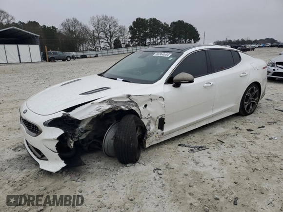 2020 Kia Stinger GT-Line with VIN KNAE15LA7L6084725, listed as a Copart auction lot 86960634 with 92,929 mi miles and Salvage Title. Bid and sale history available at carsss.com. Image 1.