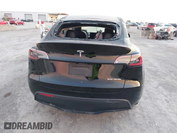 2023 Tesla Model Y Long Range z VIN 7SAYGDEE2PA166042, wystawiony jako IAAI lot #41348960 z przebiegiem Nie podano mil oraz . Historia ofert i sprzedaży dostępna na DreamBid. Obrazek 16.