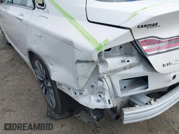 2015 Lincoln MKZ с VIN 3LN6L2G96FR615416, выставлен на аукционе IAAI как лот 41962610 с пробегом 61 265 миль миль и . История ставок и продаж доступна на DreamBid. Изображение 6.