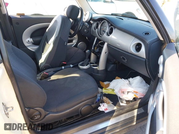 2003 MINI Hardtop with VIN WMWRC33433TE14150, listed as a IAAI auction lot 41313860 with 209,684 mi miles and . Bid and sale history available at DreamBid. Image 5.