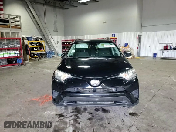 2017 Toyota RAV4 LE with VIN 2T3BFREV3HW617738, listed as a Copart auction lot 58712515 with 117,310 mi miles and Salvage title. Bid and sale history available at DreamBid. Image 14.