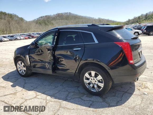 2014 Cadillac SRX Luxury Collection z VIN 3GYFNEE32ES647165, wystawiony jako Copart lot #52331335 z przebiegiem 27 277 mil mil oraz Szkoda całkowita • Salvage title. Historia ofert i sprzedaży dostępna na DreamBid. Obrazek 2.