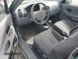 2003 Hyundai Accent GL with VIN KMHCG35C13U277732, listed as a Copart auction lot 72276634 with 135,176 mi miles and Salvage Title. Bid and sale history available at carsss.com. Image 8.