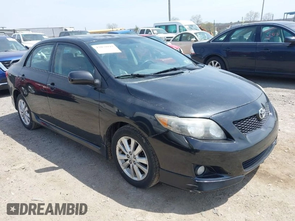 2009 Toyota Corolla with VIN 1NXBU40E29Z085117, listed as a IAAI auction lot 42059893 with 199,576 mi miles. Bid and sale history available at carsss.com. Image 1.