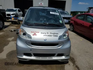 2009 Smart fortwo Passion z VIN WMEEK31X59K222243, wystawiony jako Copart lot #57106435 z przebiegiem 58 556 mil mil oraz Szkody całkowita. Historia ofert i sprzedaży dostępna na DreamBid. Obrazek 5.