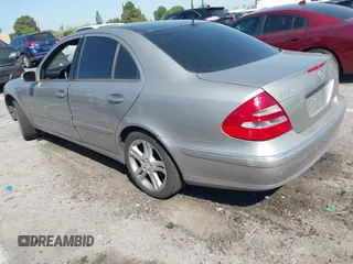 2006 Mercedes-Benz E-Class 3.5L with VIN WDBUF56J96A838185, listed as a IAAI auction lot 41981543 with 213,431 mi miles. Bid and sale history available at carsss.com. Image 3.
