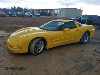 2004 Chevrolet Corvette with VIN 1G1YY22G645102213, listed as a Copart auction lot 84958784 with 77,338 mi miles and Salvage Title. Bid and sale history available at carsss.com. Image 1.