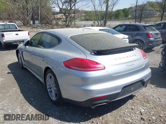 2014 Porsche Panamera z VIN WP0AA2A70EL007514, wystawiony jako IAAI lot #41910398 z przebiegiem 72 434 mil mil oraz . Historia ofert i sprzedaży dostępna na DreamBid. Obrazek 3.