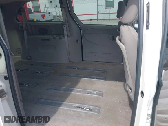 2003 Dodge Grand Caravan with VIN 2D4GP443X3R171373, listed as a IAAI auction lot 41645178 with 163,358 mi miles and . Bid and sale history available at DreamBid. Image 8.