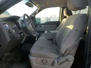 2010 Ford F-150 XL with VIN 1FTFW1EV9AFD21293, listed as a Copart auction lot 77943404 with 123,165 mi miles and Salvage title. Bid and sale history available at DreamBid. Image 7.