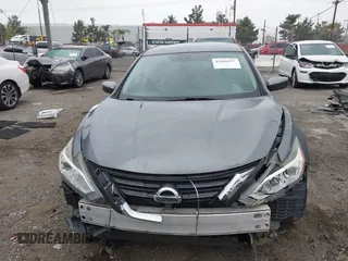 2016 Nissan Altima SR z VIN 1N4AL3AP5GC247702, wystawiony jako IAAI lot #41868357 z przebiegiem 164 688 mil mil oraz . Historia ofert i sprzedaży dostępna na DreamBid. Obrazek 13.