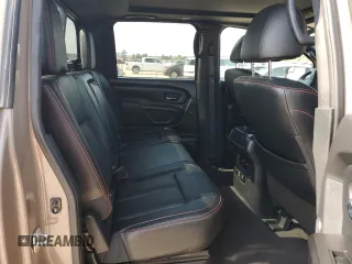 2021 Nissan Titan Pro-4X с VIN 1N6AA1ED2MN533749, выставлен на аукционе Copart как лот 54659655 с пробегом Не указан миль и Списание • Salvage title. История ставок и продаж доступна на DreamBid. Изображение 10.